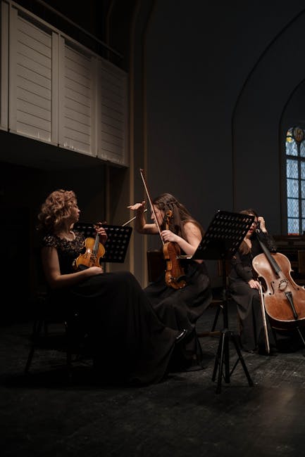 String quartet performing in front of a historic canal house at the Grachtenfestival