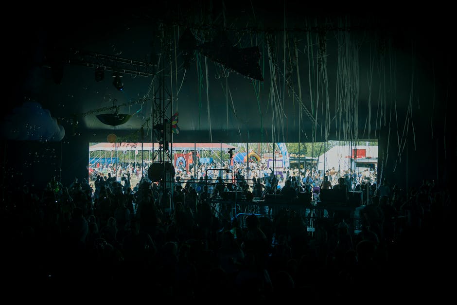 Outdoor stage and crowd at Museumplein during Uitmarkt