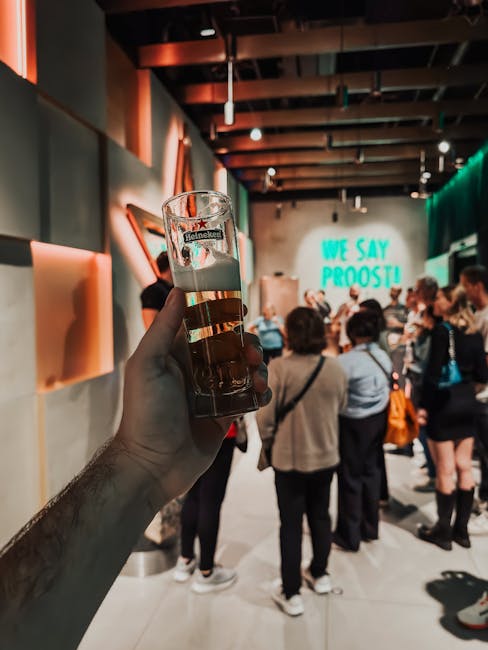 Heineken Experience brewery tasting room with visitors