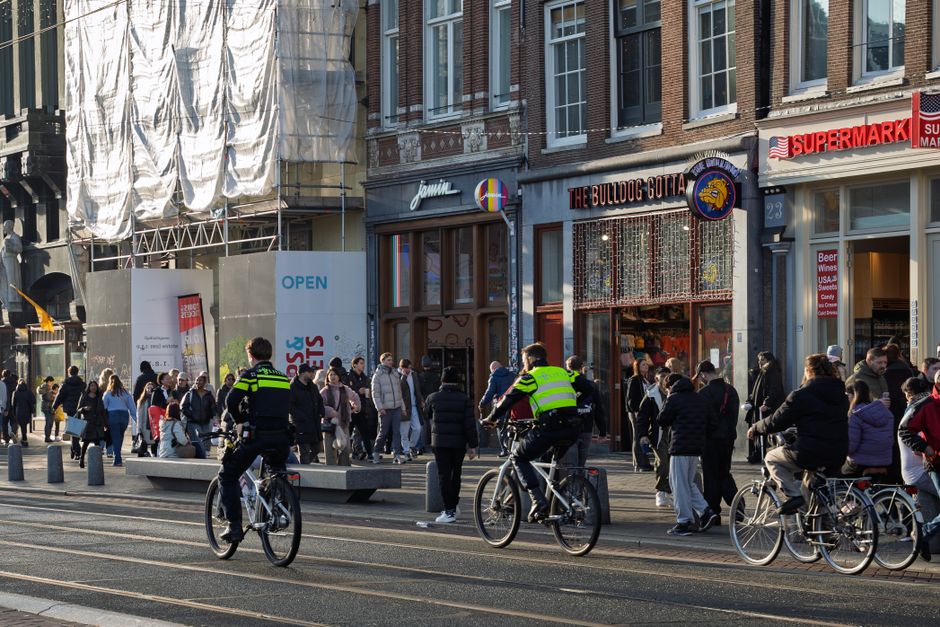 Busy bicycle lane with cyclists in Amsterdam