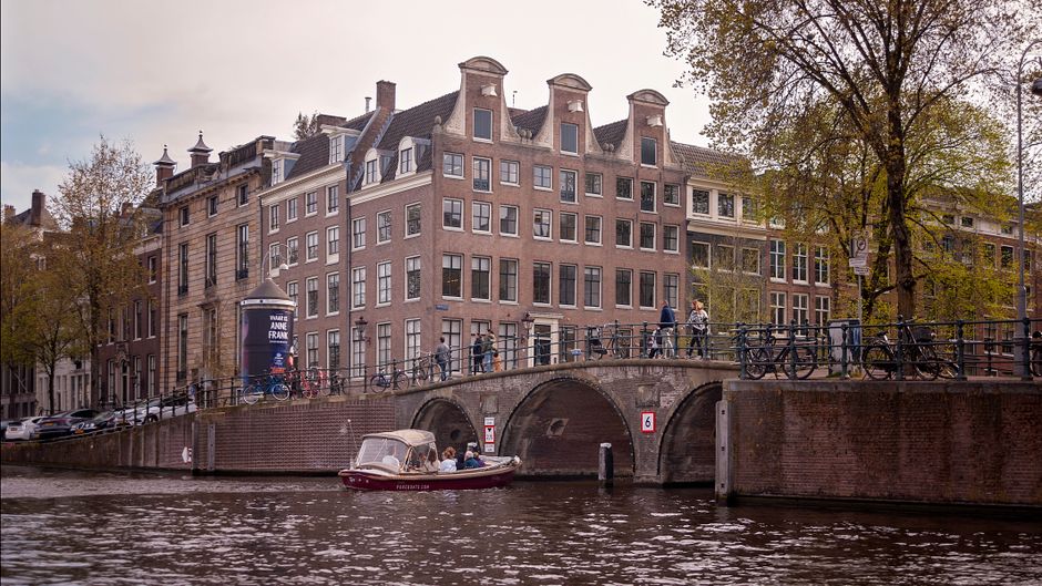 Tourists at the Anne Frank House canal entrance