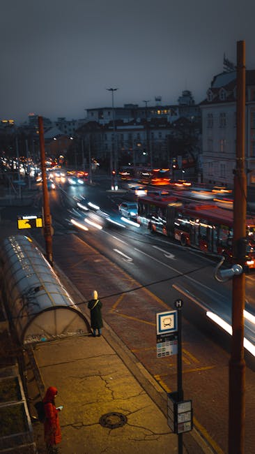 Night bus stopping at Deák Ferenc tér busy interchange