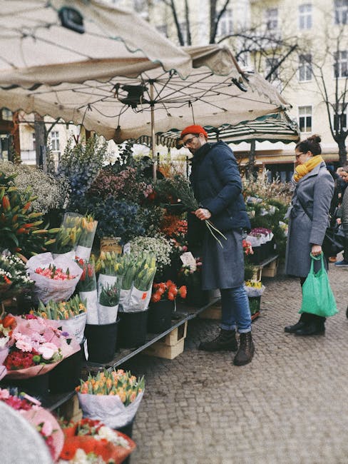 People shopping at a local farmers market in Berlin with friends