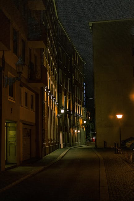 Quiet, lamp-lit street in Kreuzberg at night