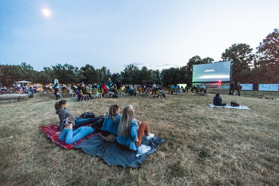 Audience watching an open-air cinema screening at Viktoriapark