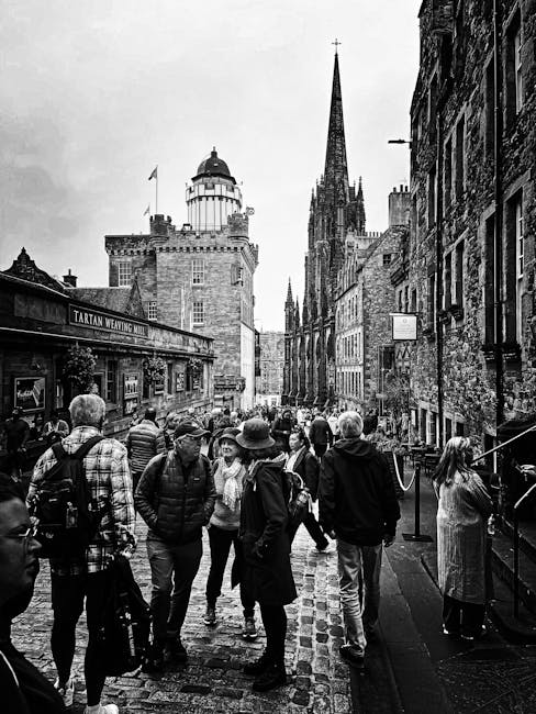 Straßenhändler verkauft Tartanschals auf der Royal Mile