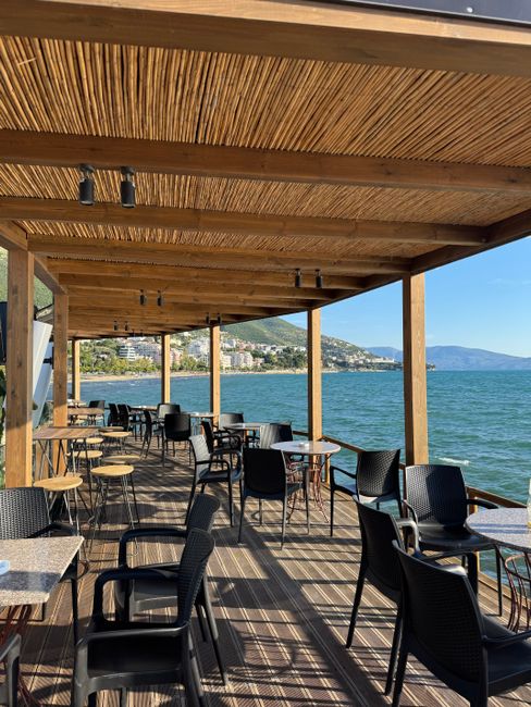 Terrace of a coastal cafe with sea view at Portobello Beach Cafe