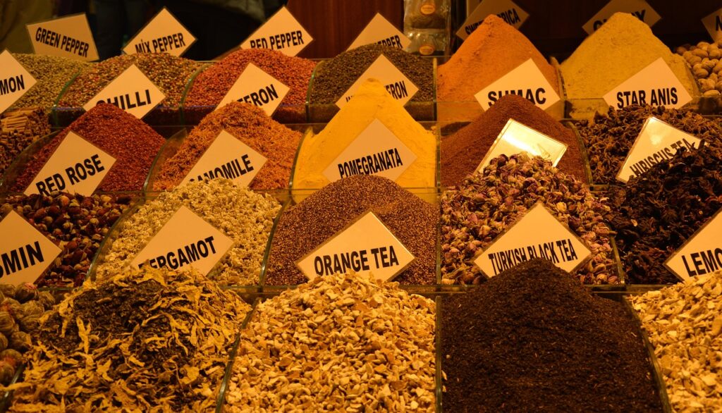 Close-up of assorted Turkish spice sacks at a bazaar