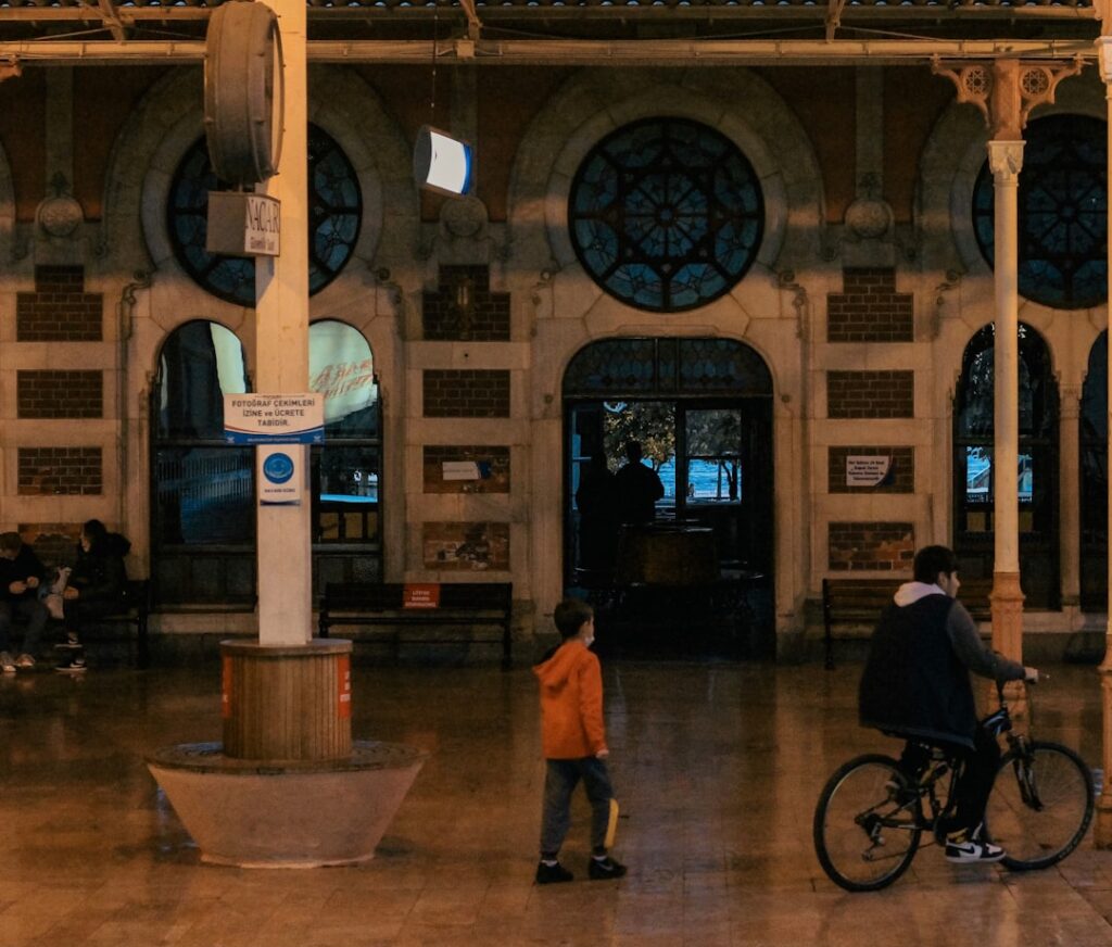Interior of historic Sirkeci station with travelers