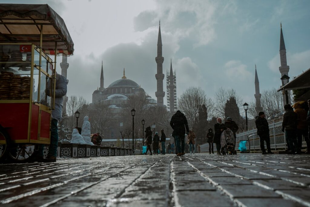 Sultanahmet tram and tourists near the Blue Mosque