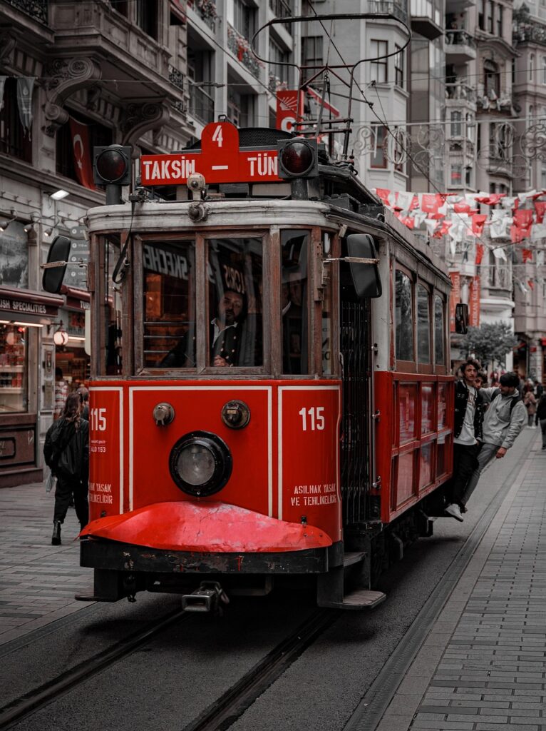 Istiklal Street with the historic tram and daytime crowds