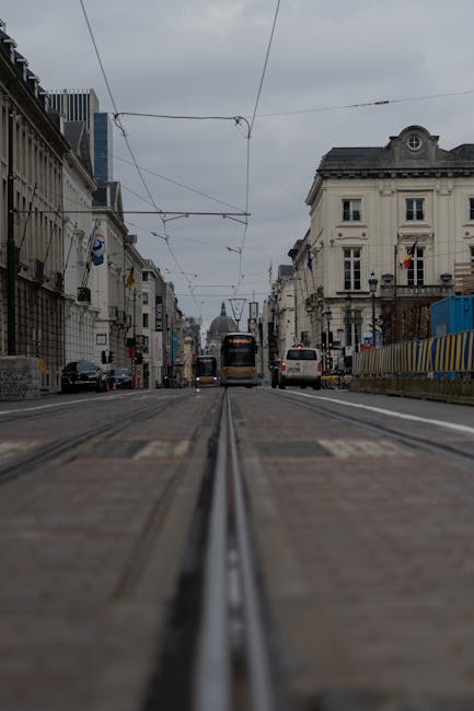tram passing by a vegan cafe area in Brussels