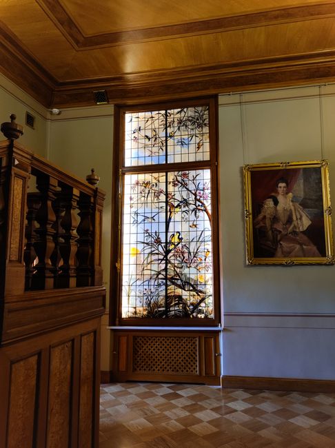 Interior of the Marc Chagall museum with stained-glass windows and paintings