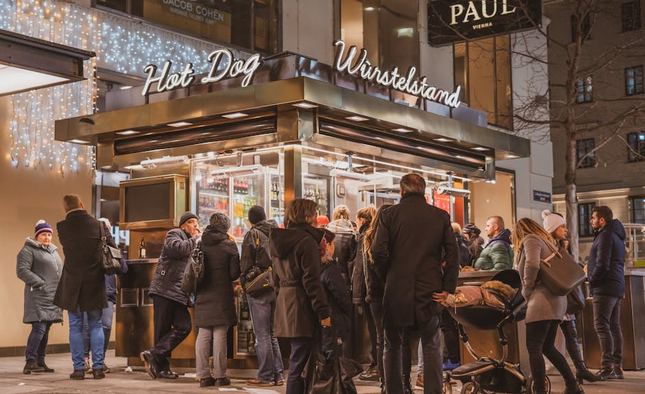 Bancarella di street food vegan a Vienna con folla serale
