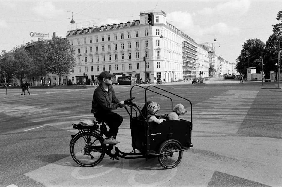 Family using a cargo bike outside a kindergarten in Copenhagen