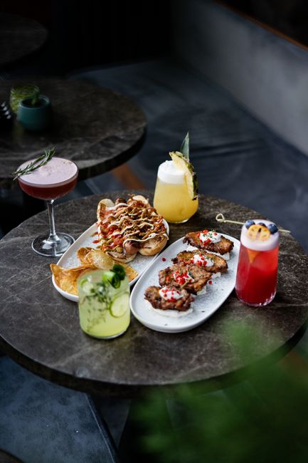 Low-light cocktail bar serving small plates