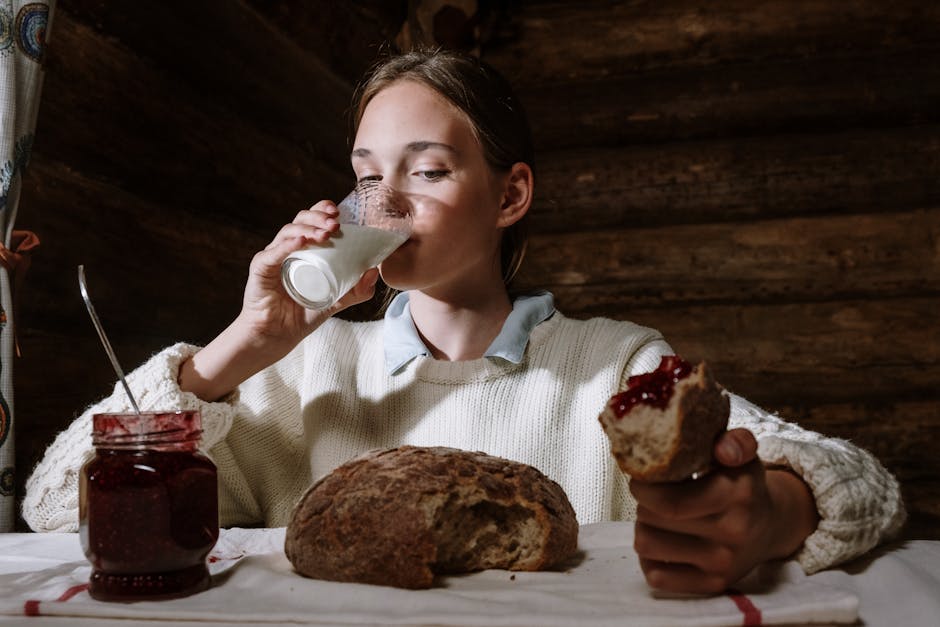 Travelers packing local food souvenirs like rye bread and jam bottles for departure