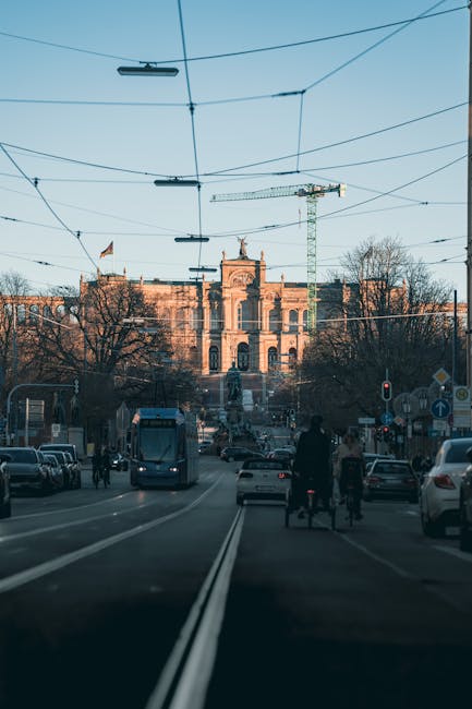 Busy Munich street with tram and cyclists