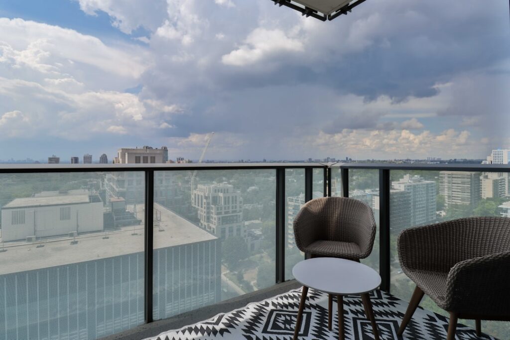 City apartment interior with living room and balcony