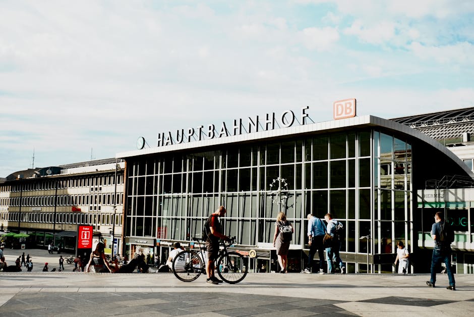 Exterior facade of Munich main train station with busy entrance