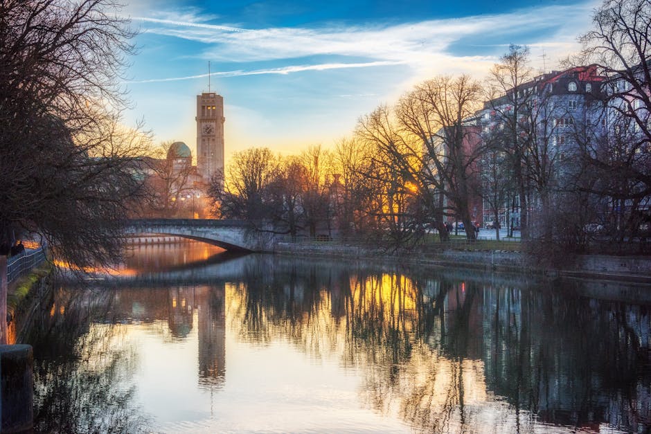 Munich skyline with River Isar and bridges at golden hour