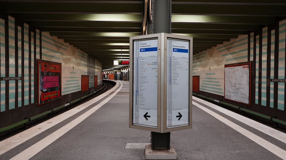 Modern U-Bahn platform with clear signage and electronic timetables