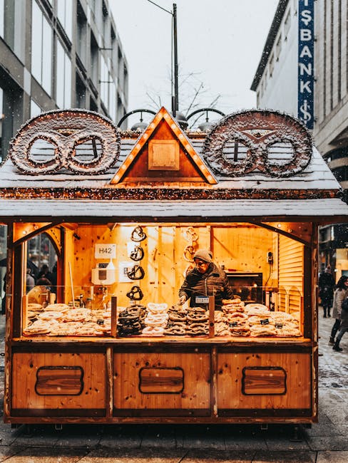 Traditionele Beierse pretzelverkoper op de Viktualienmarkt