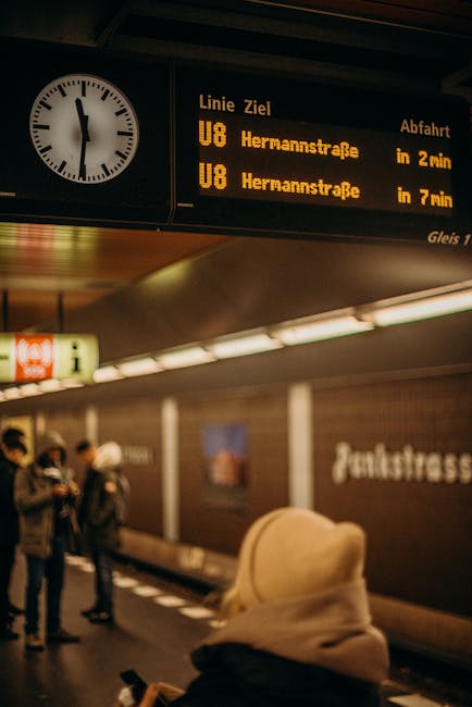 U‑Bahn station platform with electronic timetable displays