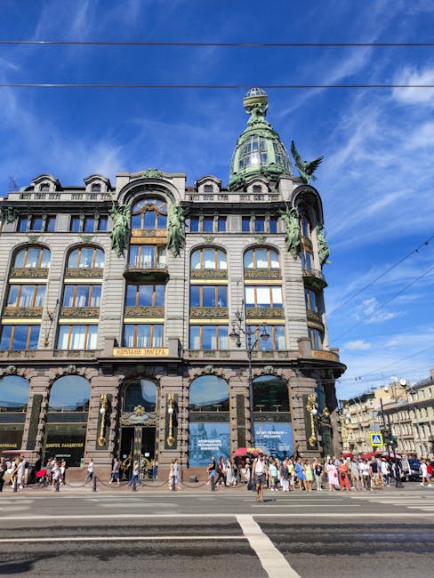 tourists by a historic building facade on Nevsky Prospekt