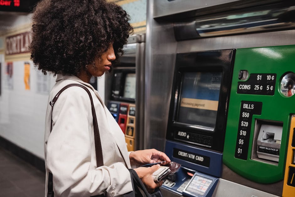 Passenger using a Troika card at a metro ticket kiosk