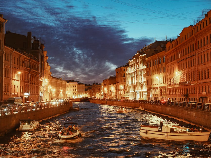 Saint Petersburg riverside at evening with golden light over the canals