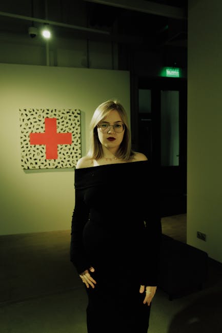 Small contemporary art gallery with people at an opening night in Dublin
