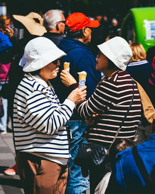 Touristen an der Ha'penny Bridge essen ein Eis