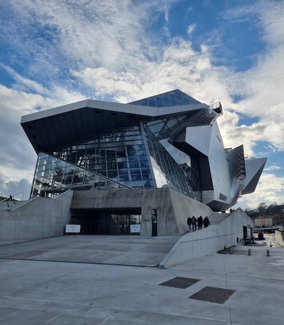 Confluences Museum exterior at sunset