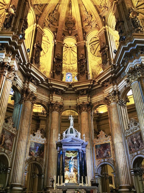 Interior view of Malaga Cathedral with ornate altar