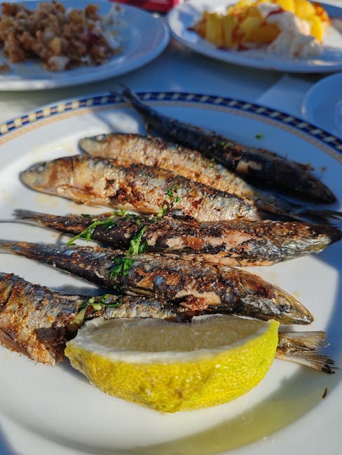 chiringuito nad morzem z grillowanymi sardynkami
