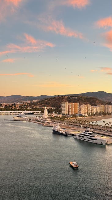 Muelle Uno modern waterfront promenade with yachts