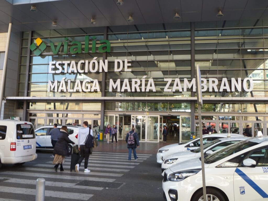 Málaga airport departures hall with travelers