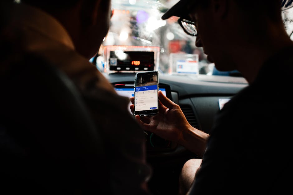 People using a rideshare app to book a ride from Málaga airport pickup zone