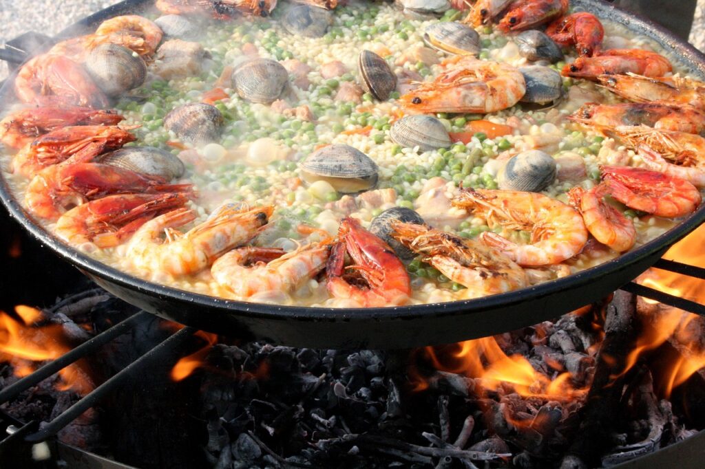 Seafood paella dish at a seaside restaurant in Málaga port