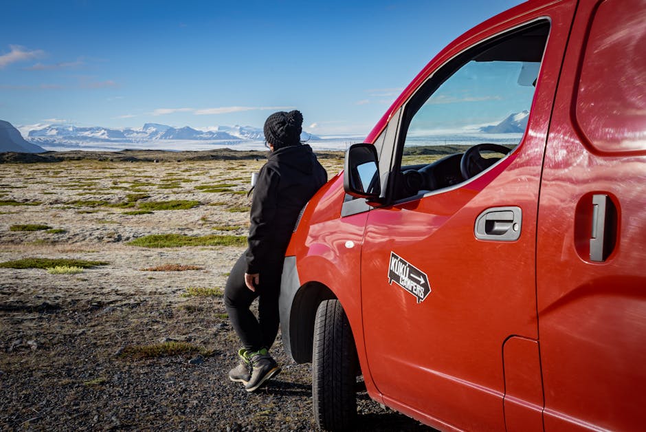 Rental car parked on an Icelandic gravel road