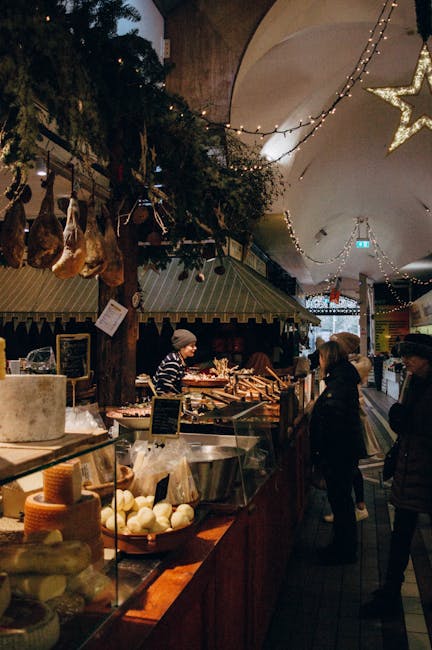 Überdachte Marktstände in Titan mit Käse und Obst