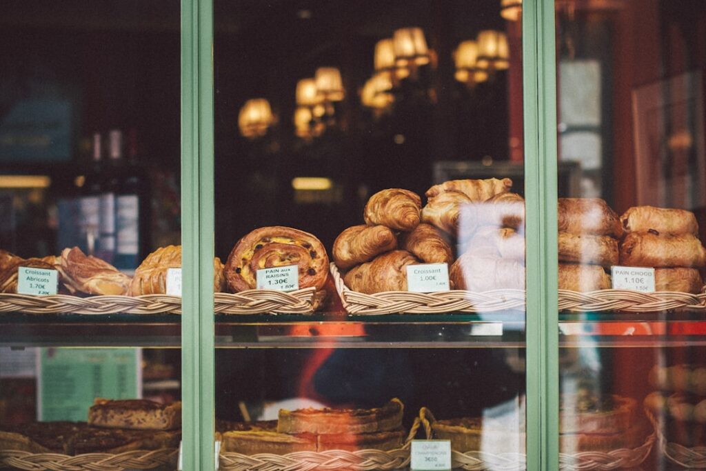 night view of a small bakery display with pastries