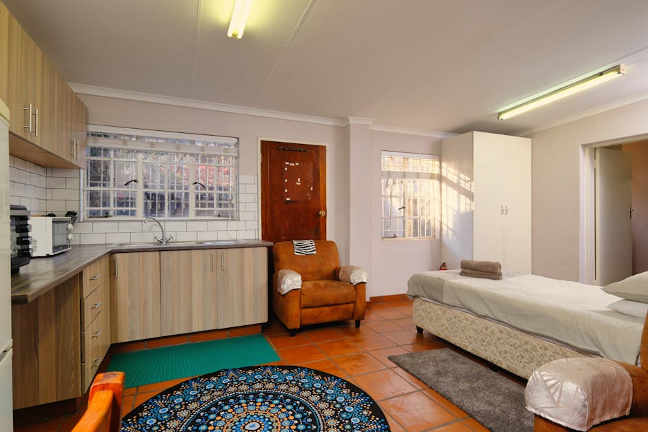 Cozy studio apartment interior with kitchenette