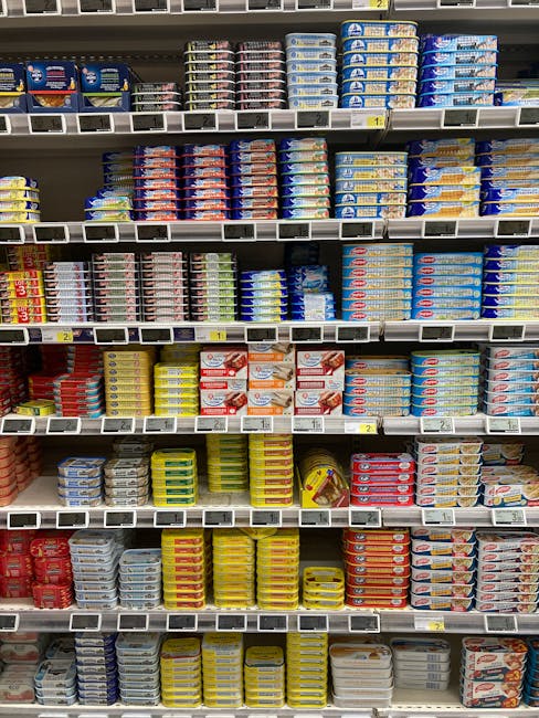 Shelf display of artisanal seafood tins at La Conserverie du Vieux-Port