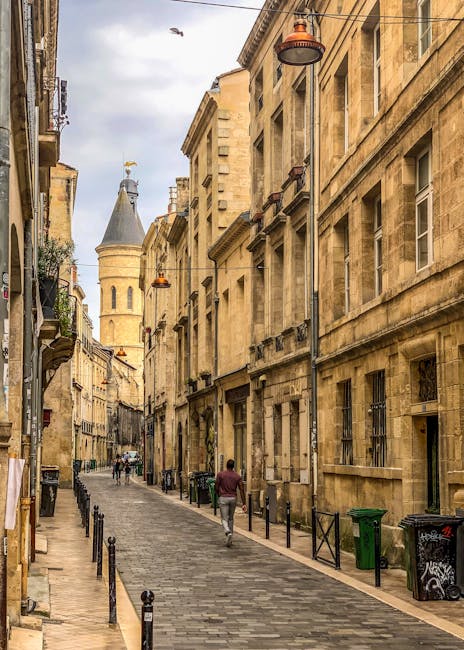 Narrow old street in Bordeaux bathed in afternoon light