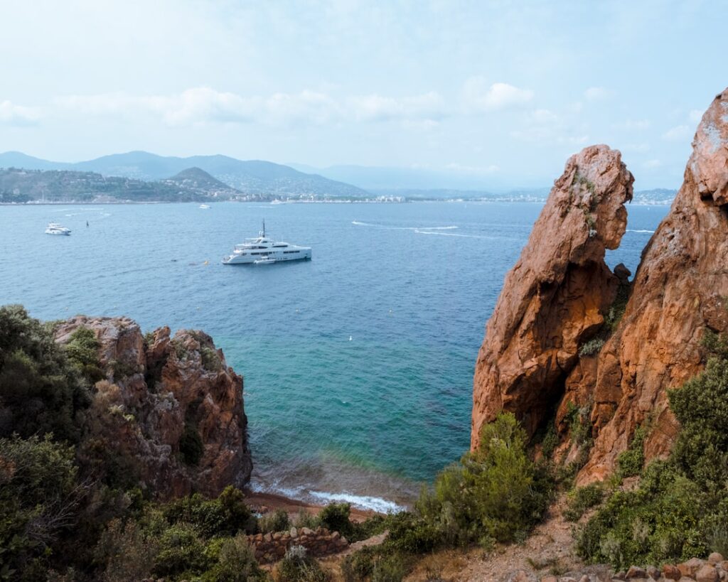Boat tour around the Calanques de Piana coastal rock formations