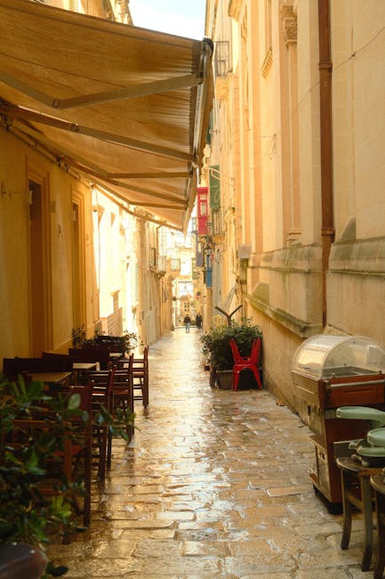 Quirky narrow street bar interior on Strait Street, Valletta