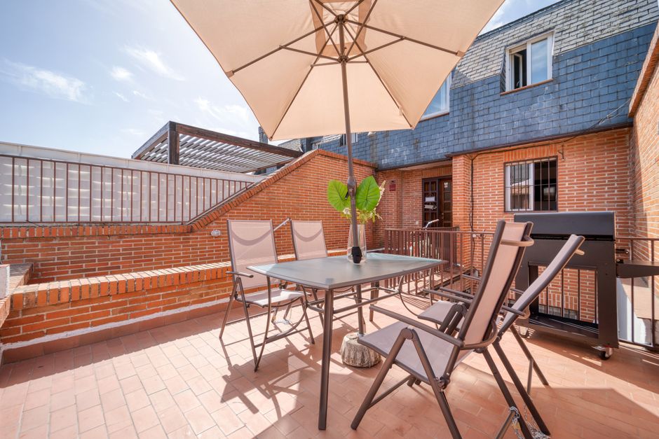 Family eating on the terrace of a self-catering apartment
