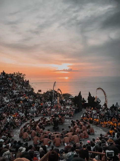 Audience enjoying sunset concert by the sea
